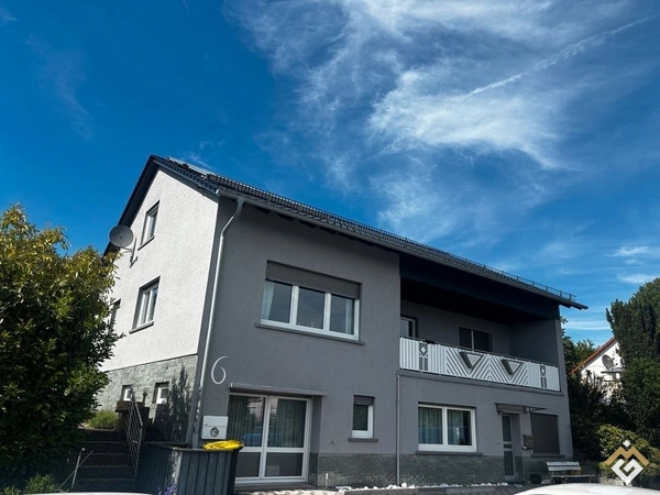 Modernized single-family house with a separate apartment